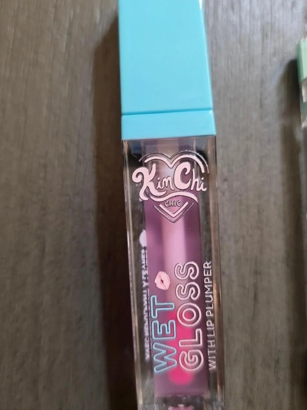 Kimchi Chic Beauty Wet Gloss & Spinning Hearts Love Palette in Purple and Aqua